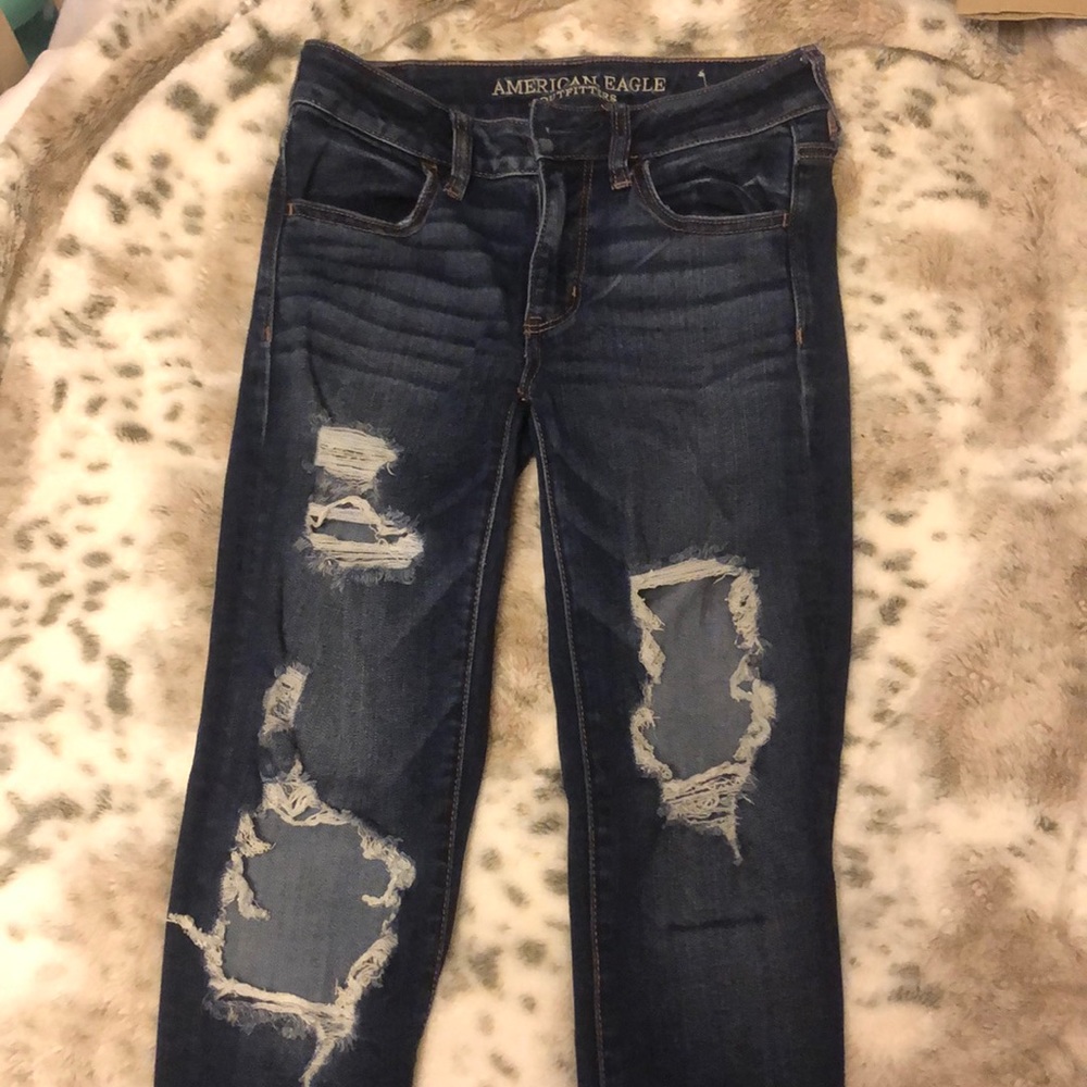Dark holy skinny jeans